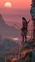 Warrior observes sunset from cliff edge in vast wilderness landscape photo