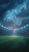 Stadium under a dramatic sky with bright lights illuminating the empty field during evening hours photo