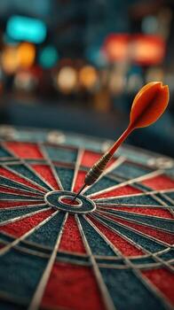 Dart hitting the bullseye on a dartboard in an exciting indoor game setting photo