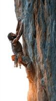 Rock climber ascends steep cliff at sunset in dramatic display of strength and skill photo
