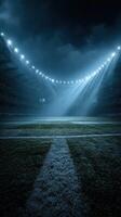 Stadium illuminated by beams of light during a nighttime soccer match with an empty field and dramatic atmosphere photo