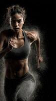 Dynamic female athlete sprinting with intense focus and determination in a dark environment photo