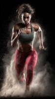 Female athlete running in a dynamic pose, showcasing strength and determination during a training session indoors photo