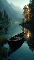 Serene morning at a tranquil lake with a wooden boat amidst mountains and trees photo