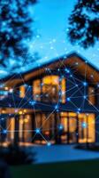 Modern house illuminated at dusk with digital network connections symbolizing smart home technology photo