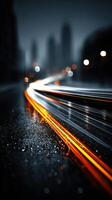 Glowing light trails reflect on wet city streets under urban skyline at night photo