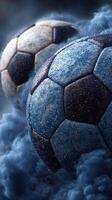Shadowy soccer balls surrounded by mist create a dramatic atmosphere in a sports setting photo