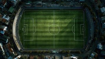 Stadium field viewed from above on a bright day with sunlight casting shadows on the grass photo