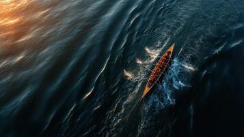 Rowers navigate calm waters during sunset in tranquil evening light photo