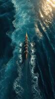 Rowers navigate through vibrant ocean waves at sunset in a competitive race photo