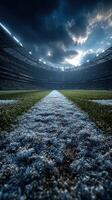 Dramatic view of an empty stadium field under moody clouds during a late afternoon photo