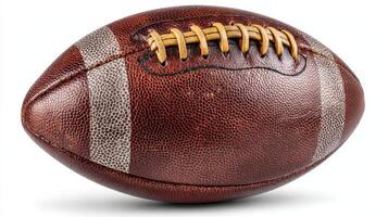 Vintage leather football resting on a surface with natural lighting showing its textured details and classic design photo