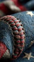 Detailed close-up of Americana fabric showcasing stitches and patterns in rich colors representing heritage and craftsmanship photo