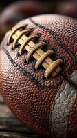 Detailed close-up of a worn leather football showcasing its texture and stitching at a sports event photo