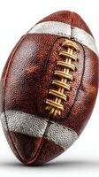 Detailed view of a textured football showcasing its laces and design in bright lighting photo