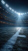 Illuminated football field ready for the game under bright stadium lights at night photo