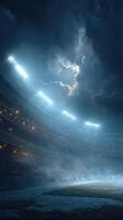 Spectators gather under bright stadium lights before the big game amidst a dramatic night sky photo