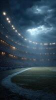 Evening match in a large football stadium under a dramatic sky with bright lights illuminating the field photo