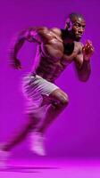 Muscular athlete sprinting with intensity under vibrant purple lighting during high-speed training session photo