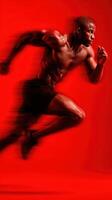 Dynamic sprint of an athletic man in a powerful running pose against a bold red background photo