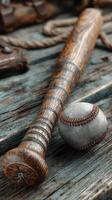 Vintage baseball bat and ball on rustic wooden surface showcasing sporting heritage and craftsmanship photo
