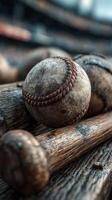 Baseball and wooden bats resting together on a rustic surface during an outdoor baseball practice session photo
