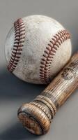 Classic baseball and bat resting on a smooth surface, showcasing sports equipment for enthusiasts and players photo