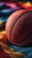 Close-up view of a basketball resting on colorful fabric indicating a lively sports environment at a game day photo