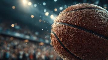 Close-up of basketball with droplets in a crowded arena during an exciting game in the evening photo