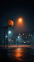 Misty night basketball court with glowing streetlights and fog in urban setting photo