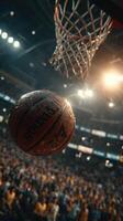 Basketball in mid-air during crucial moment of game inside packed sports arena photo
