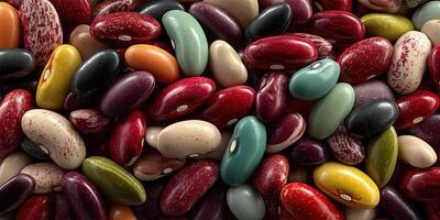 Colorful assortment of various dry beans displayed on a textured surface in natural light photo