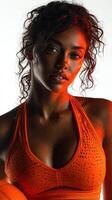 Fitness enthusiast showcasing determination and strength in a vibrant workout environment during intense training photo