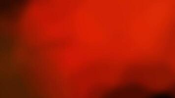 Dark red blurred abstract background with soft gradients video
