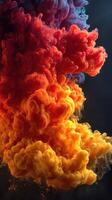Colorful smoke clouds swirl in vibrant patterns creating an artistic display in a dark setting photo
