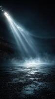 Stadium illuminated by dramatic lighting during an empty night event showcasing a haunting atmosphere photo