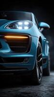 Stylish blue sports car showcasing unique design features in a dramatic lighting setup photo