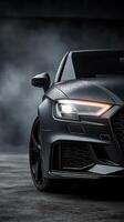 Sporty black car with sleek design parked on a rainy night in a moody atmosphere photo