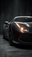 Sleek black sports car captures attention in a dimly lit garage setting photo