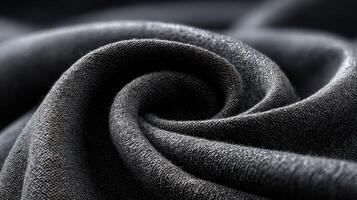 Close-up of textured black fabric revealing intricate details and soft threads photo