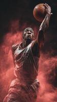 Dynamic basketball player soaring for a slam dunk in a dramatic, smoky setting during a nighttime game photo