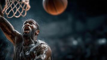 Athlete performs a dynamic basketball slam dunk in a high-energy arena during a competitive game photo