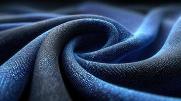Fabric texture featuring deep blue shades intertwined, showcasing soft waves and intricate patterns in natural light photo