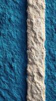 Colorful textured wall with vibrant blue and white stripes in a modern artistic setting photo
