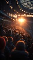 Crowd gathers at stadium during sunset for memorable sporting event filled with excitement and anticipation photo