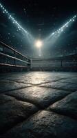 Bright lights illuminate an empty boxing ring ready for the fight night excitement at a packed arena photo
