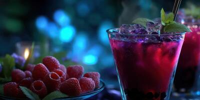 Refreshing berry cocktail served with fresh raspberries at an elegant evening gathering photo