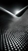 Intricate patterns form mesmerizing waves of texture under soft light in a dramatic black and white landscape photo