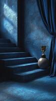 Elegant trophy displayed beside stairs in a dimly lit blue-toned space creating a dramatic atmosphere photo