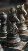 Chess pieces in dark colors with a focus on a knight adorned with a crown during a strategic game in a cozy setting photo